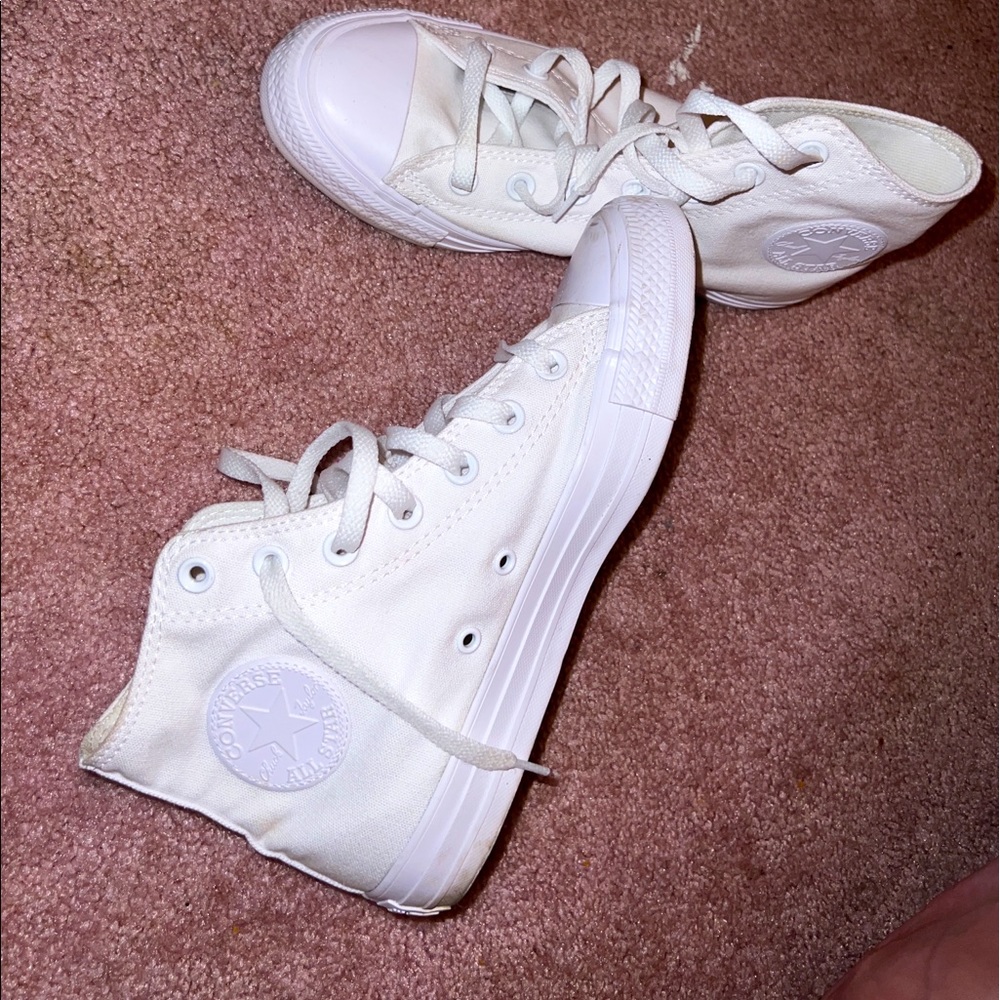Woman’s All white high top converse